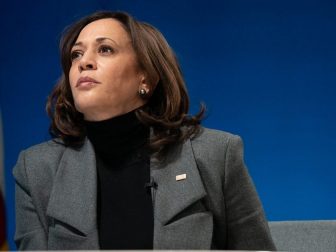 Vice President Kamala Harris listens during a virtual tour of the Community Vaccination Center at State Farm Stadium in Glendale, Arizona Monday, Feb. 8, 2021, in the South Court Auditorium in the Eisenhower Executive Office Building of the White House. (Official White House Photo by Lawrence Jackson)