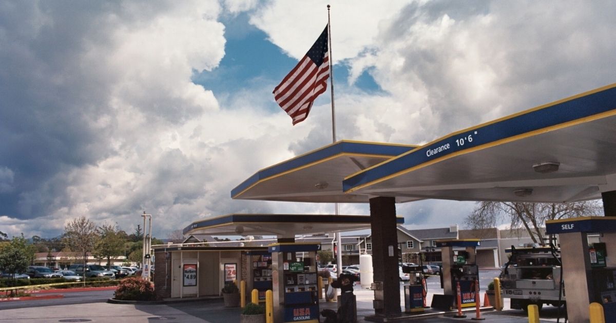 Flag, Gas Station, Mall, and Sky