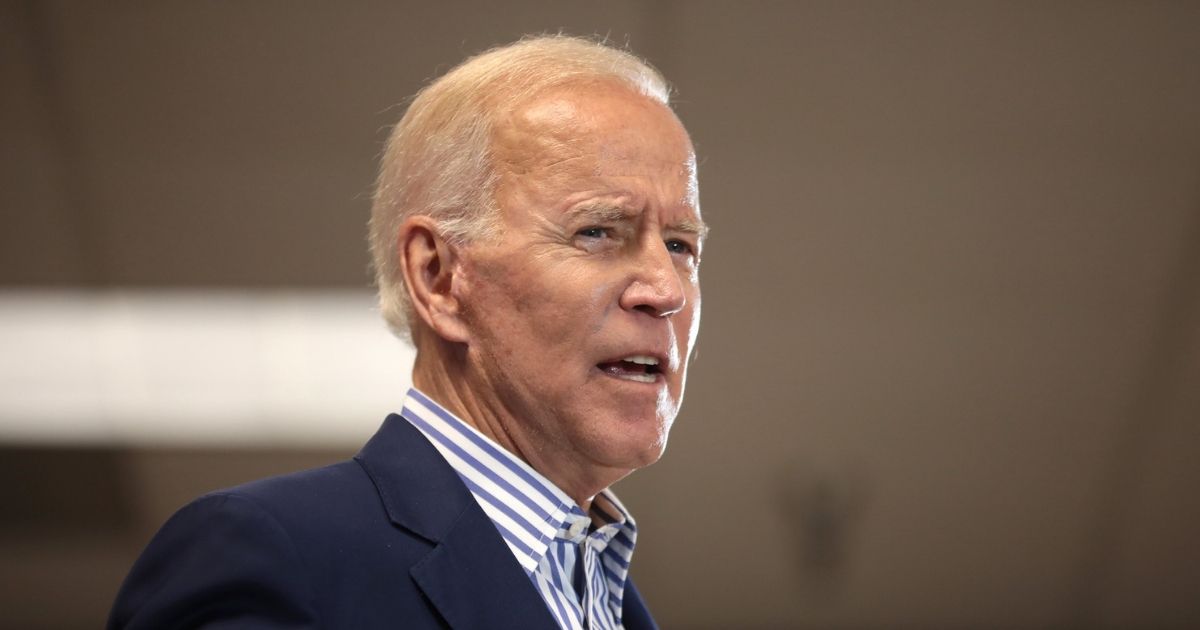 Former Vice President of the United States Joe Biden speaking with supporters at a town hall hosted by the Iowa Asian and Latino Coalition at Plumbers and Steamfitters Local 33 in Des Moines, Iowa.