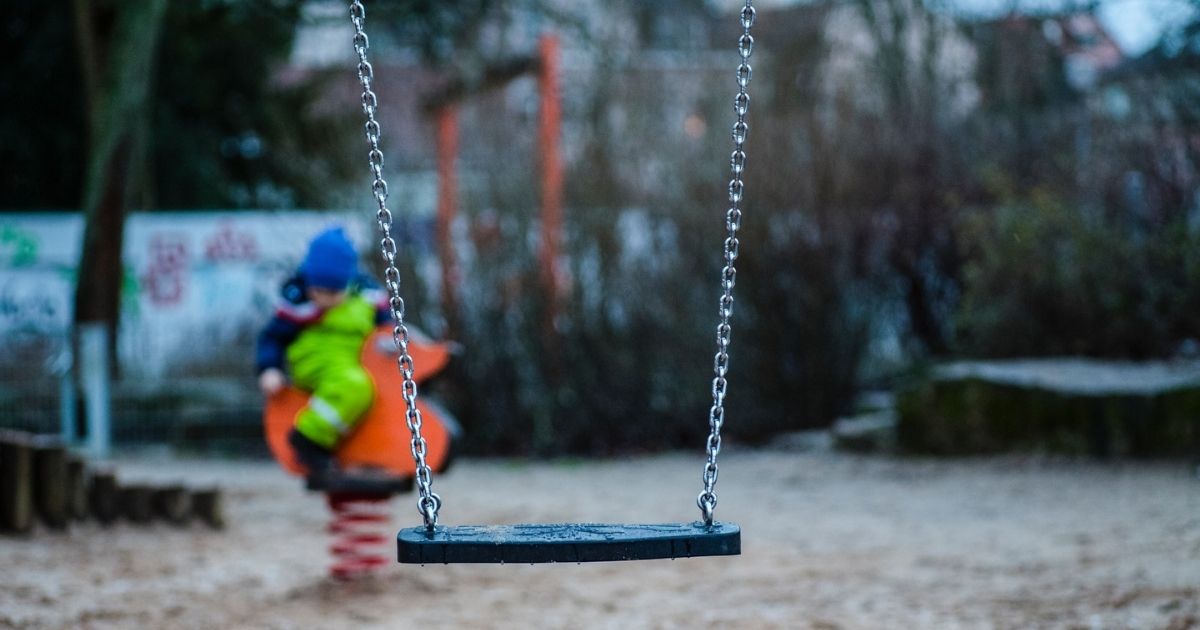 Empty swing at a playground