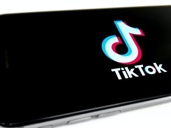 TikTok splash screen on a phone