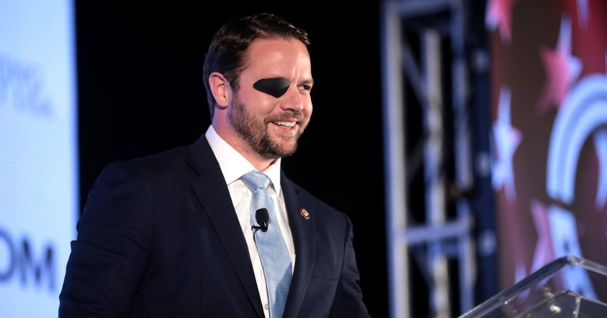 U.S. Congressman Dan Crenshaw speaking with attendees at the 2019 Teen Student Action Summit hosted by Turning Point USA at the Marriott Marquis in Washington, D.C.
