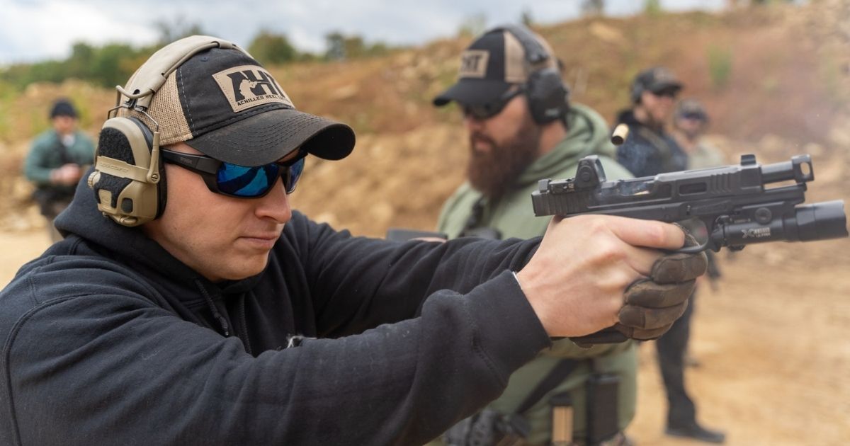 Men at an outdoor gun range