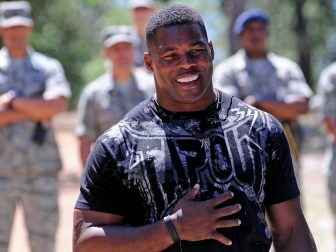 Football great Herschel Walker speaks to the Class of 2016 during Basic Cadet Training in the U.S. Air Force Academy's Jacks Valley in Colorado Springs, Colo. July 17, 2012. Walker spent time talking to the Class of 2016 about resiliency, his own personal struggles in life and encouraged the cadets to reach out and seek help if they need it.