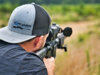 Man shooting at an outdoor gun range