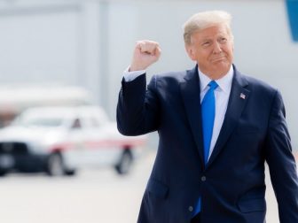President Donald J. Trump gestures with a fist pump as he walks across the tarmac upon his arrival Thursday, Oct. 15, 2020, to Pitt-Greenville Airport in Greenville, S.C. (Official White House Photo by Shealah Craighead)