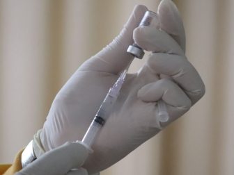 taking sinovac covid-19 vaccination injection