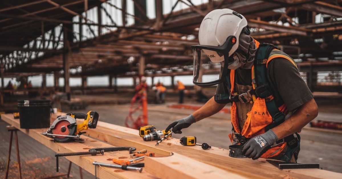 Construction worker in an orange vest