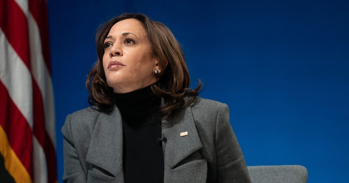 Vice President Kamala Harris listens during a virtual tour of the Community Vaccination Center at State Farm Stadium in Glendale, Arizona Monday, Feb. 8, 2021, in the South Court Auditorium in the Eisenhower Executive Office Building of the White House.