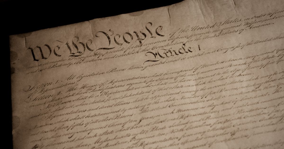 The Constitution of the United States of America is pictured.