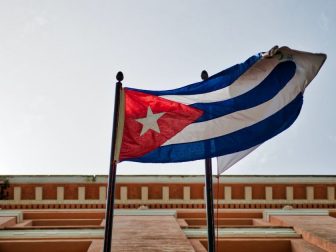 Cuban flag hanging from building window
