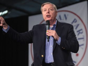 U.S. Senator Lindsey Graham speaking with attendees at the 2015 Iowa Growth & Opportunity Party at the Varied Industries Building at the Iowa State Fairgrounds in Des Moines, Iowa