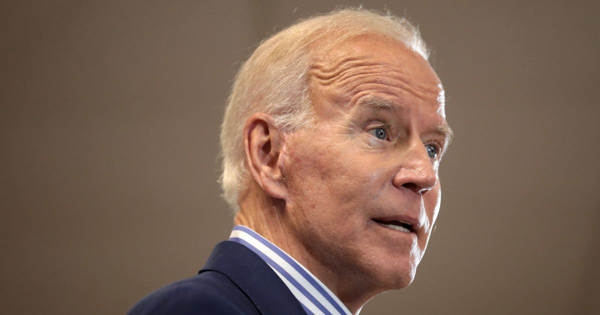 Former Vice President of the United States Joe Biden speaking with supporters at a town hall hosted by the Iowa Asian and Latino Coalition at Plumbers and Steamfitters Local 33 in Des Moines, Iowa.