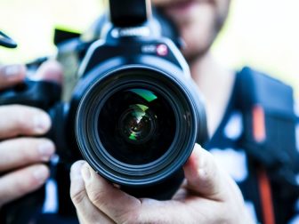 Person holding a camera