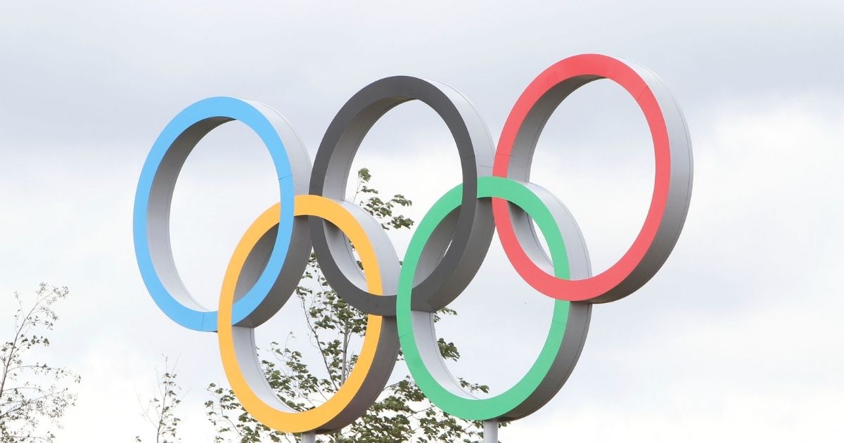 The above photo shows the Olympic rings above the Live Site East in front of the Velodrome.