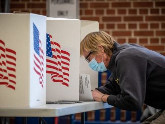 Voters in Des Moines precincts 43, 61 and 62 cast their ballots at Roosevelt High School.
