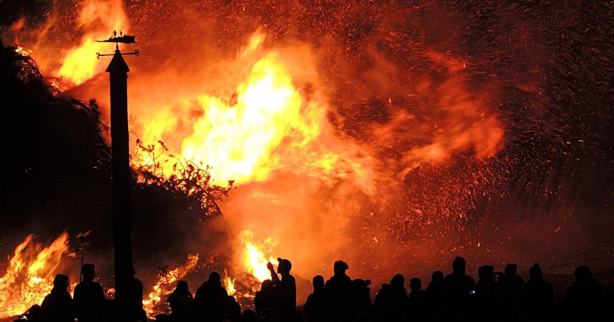 People watching a wildfire burn