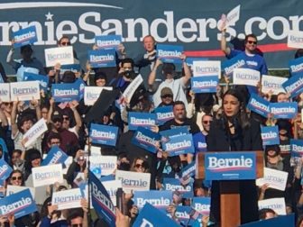 Thousands attend a #BerniesBack rally in New York, where Democratic Rep. Alexandria Ocasio-Cortez, center, is officially endorsing Vermont Sen. Bernie Sanders for president.