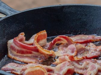 Bacon cooing in cast iron skillet