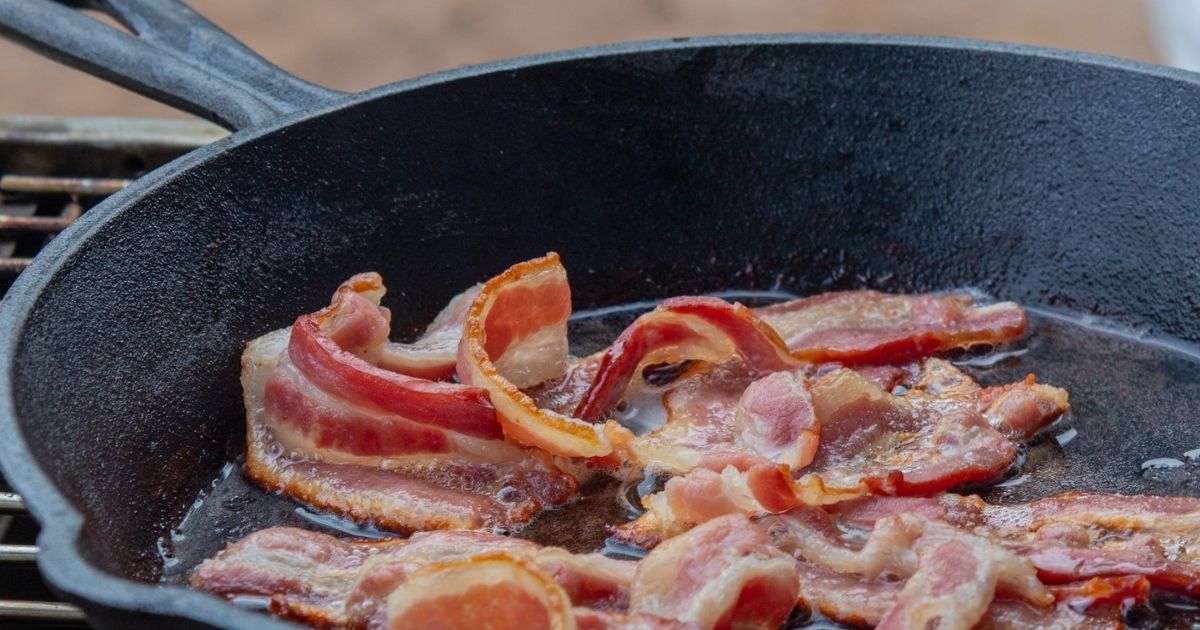 Bacon cooing in cast iron skillet