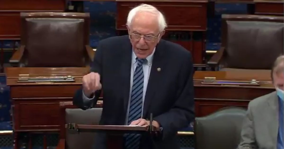 Independent Sen. Bernie Sanders of Vermont speaks as floor debate on a $3.5 trillion budget plan begins Tuesday.