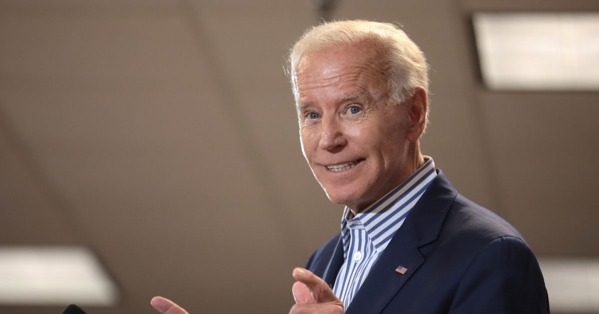 Former Vice President of the United States Joe Biden speaking with supporters at a town hall hosted by the Iowa Asian and Latino Coalition at Plumbers and Steamfitters Local 33 in Des Moines, Iowa.