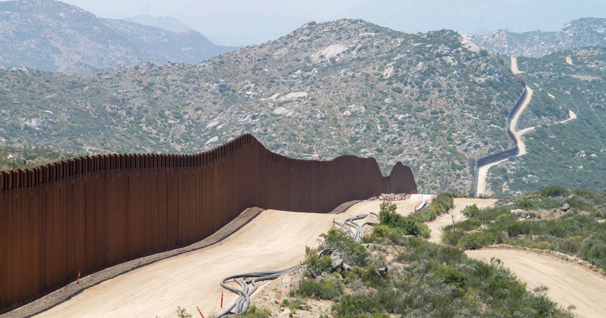 The Mexican-American border, with some construction still ongoing on the American side.