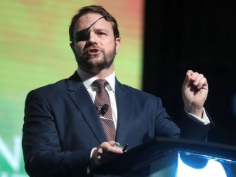 U.S. Congressman Dan Crenshaw speaking with attendees at the 2019 Student Action Summit hosted by Turning Point USA at the Palm Beach County Convention Center in West Palm Beach, Florida.