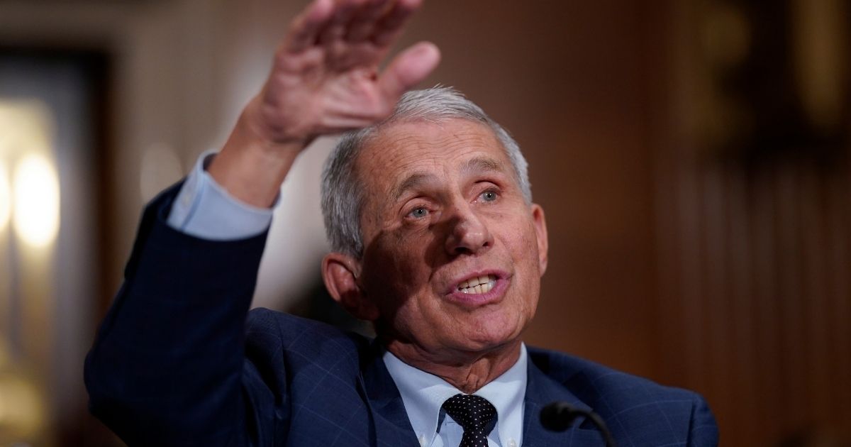 Top infectious disease expert Dr. Anthony Fauci responds to accusations by Sen. Rand Paul, R-Ky., as he testifies before the Senate Health, Education, Labor, and Pensions Committee, July 20, 2021 on Capitol Hill in Washington, DC. Cases of COVID-19 have tripled over the past three weeks, and hospitalizations and deaths are rising among unvaccinated people.