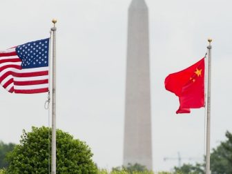 The U.S. and Chinese flags wave in the wind before a full-honor welcome ceremony for Chinese Gen. Fang Fenghui, chief of the General Staff of the People’s Liberation Army, at the Pentagon, May 15, 2014.