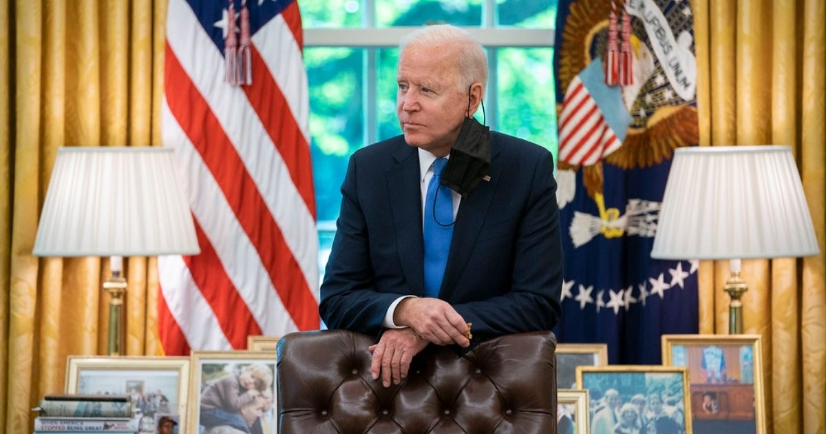 President Joe Biden prepares remarks regarding the Colonial Pipeline cyberattack and resumption of operations, Thursday, May 13, 2021, in the Oval Office of the White House. (Official White House Photo by Adam Schultz)