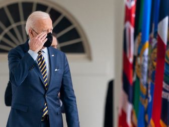 President Joe Biden salutes as he walks along the Colonnade of the White House on Friday, March 12, 2021, en route to the Oval Office. (Official White House Photo by Adam Schultz)