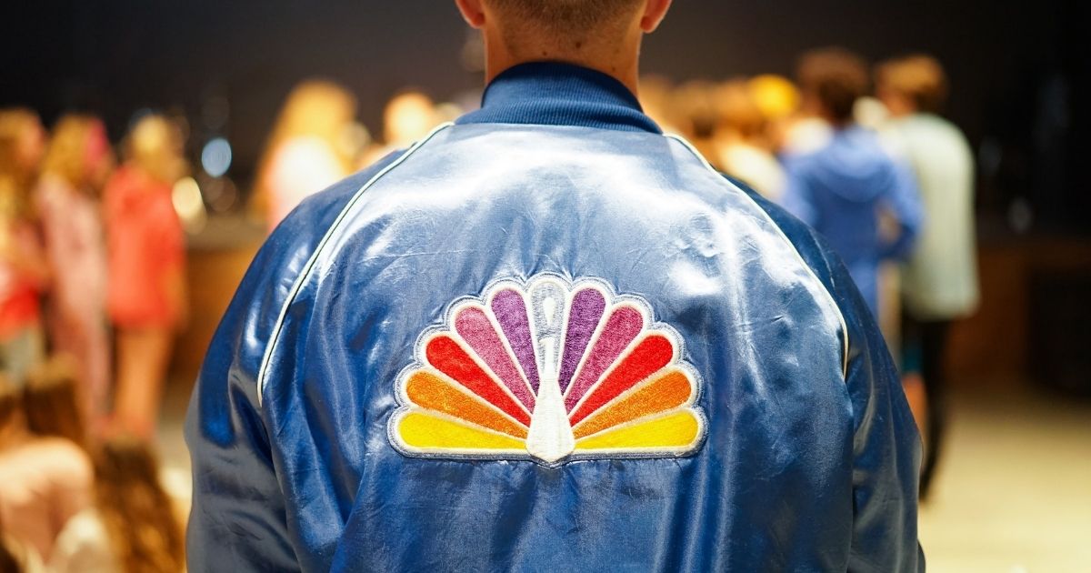 Old school NBC logo on a blue jacket
