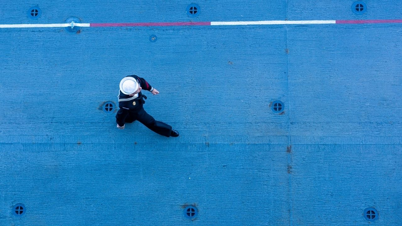 Sailor Walking on a Ships Deck