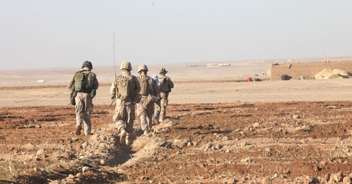 Marines and the Danish mentor team with Afghan National Army soldiers of the Shorabak Garrison Security unit, patrol to the village of Habibabad, Dec. 13. Coalition forces have been training these ANA soldiers for the last three weeks on civil affairs and security tactics.