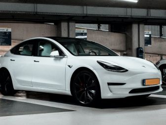 White Tesla charging