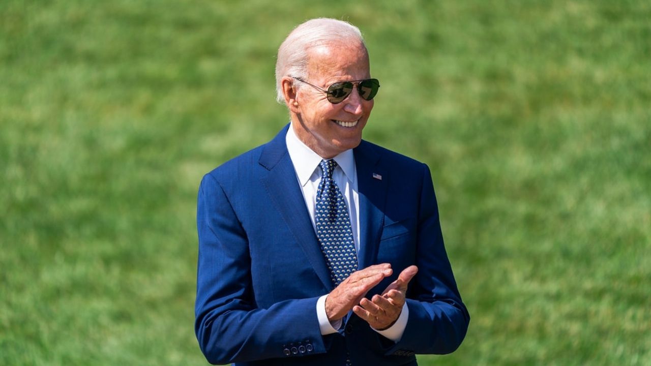 President Joe Biden claps during a clean car event Thursday, August 5, 2021 on the South Lawn of the White House.