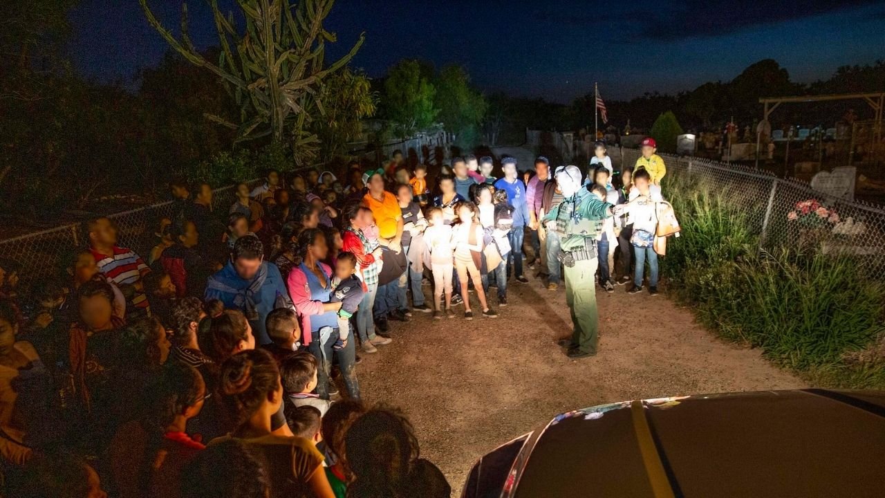 U.S. Border Patrol agents assigned to the McAllen border patrol station encounter a large group of migrants near Los Ebanos, Texas, June 15, 2019. The members of the group who illegally entered the U.S. by crossing the Rio Grande on rubber rafts turned themselves into the U.S. Border Patrol agents shortly after crossing the border.
