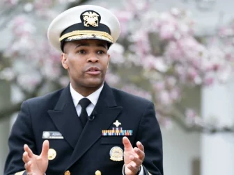 U.S. Surgeon General Jerome Adams, a member of the White House Coronavirus Task Force, answers questions during a virtual Fox News Town Hall Tuesday, March 24, 2020, in the Rose Garden of the White House.