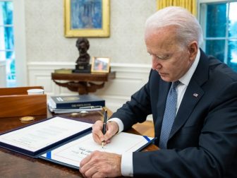 President Joe Biden signs the Emergency Security Supplemental Appropriations Act of 2021, Friday, July 30, 2021, in the Oval Office at the White House. (Official White House Photo by Adam Schultz)