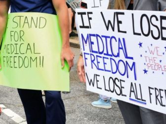 Hospital workers from Long Island, New York, protest an employee vaccine mandate.