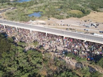 A Fox News drone captures a look at the makeshift migrant camp under the international bridge in Del Rio, Texas, on Sept. 19, 2021.