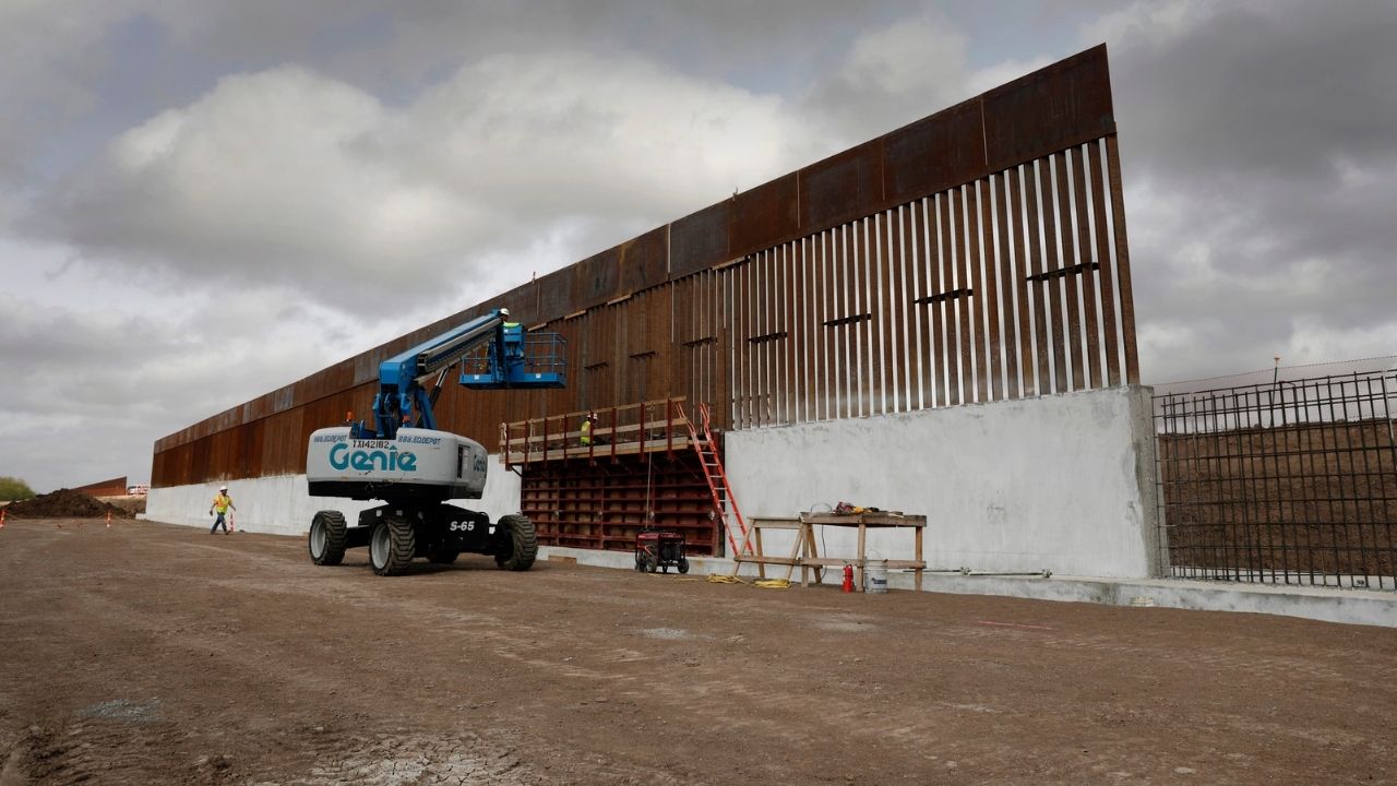 Construction crews work to erect levee wall system in a remote area south of Weslaco, Texas in the U.S. Border Patrol’s Rio Grande Valley Sector. Jan. 13, 2019. CBP Photo by Glenn Fawcett