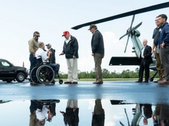 President Donald J. Trump disembarks Marine One at Orange County Airport in Orange, Texas, Saturday, Aug, 29, 2020, where he is greeted by Texas Governor Greg Abbott to visit areas impacted by Hurricane Laura.