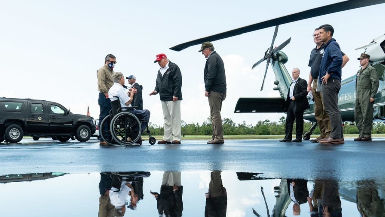 President Donald J. Trump disembarks Marine One at Orange County Airport in Orange, Texas, Saturday, Aug, 29, 2020, where he is greeted by Texas Governor Greg Abbott to visit areas impacted by Hurricane Laura.