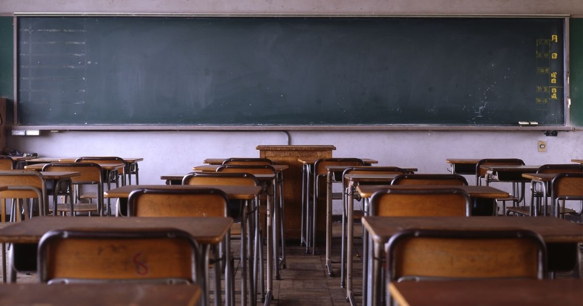 This stock image shows an empty classroom. The National School Boards Association, in a late September letter, asked the Department of Justice to classify and investigate parents as “domestic terrorists.”