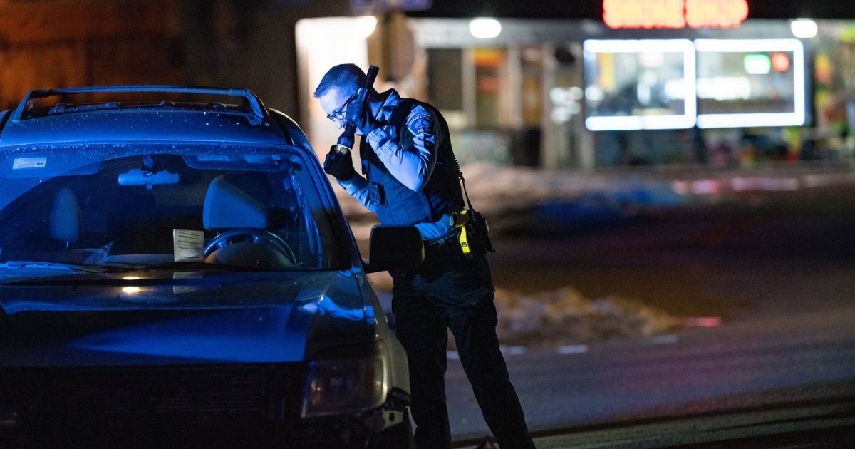 The Minneapolis Police Department responds to a car crash on the evening of February 5, 2020, at the intersection of Lyndale Avenue South and West 25th Street in Minneapolis, Minnesota. At the time of publication of these images, details about the crash was not known. (Tony Webster / Flickr)