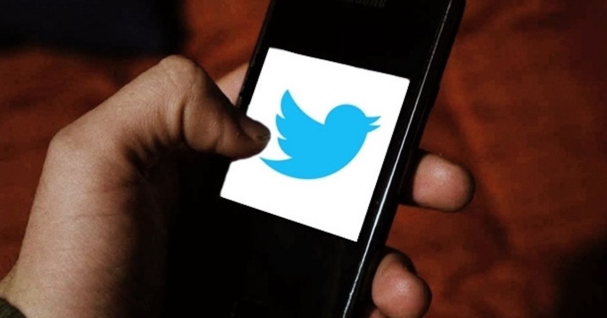 Twitter logo on a smart phone.