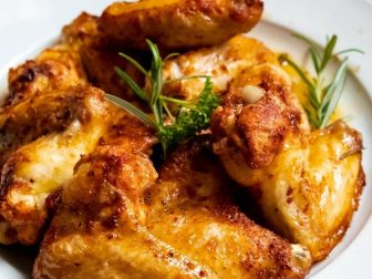 Cooked chicken on a plate. (Harry Dona / Pexels)
