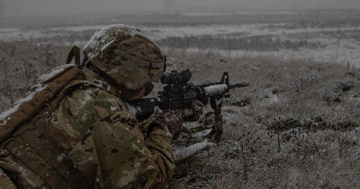 A U.S. Soldier assigned to the Michigan National Guard engages targets with his M4 rifle during the Governor’s Twenty marksmanship competition at Camp Grayling Maneuver Training Center, Michigan, November 2, 2021. Soldiers compete in four rifle and five pistol events over a three-day period, with the top 20 percent receiving a special Governor’s Twenty tab to wear on their combat uniforms. (U.S. Army National Guard photo by Capt. Joe Legros)